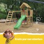 Wickey Spielturm RocketFlyer mit Rutsche, Schaukel und Kletterwand im Garten.