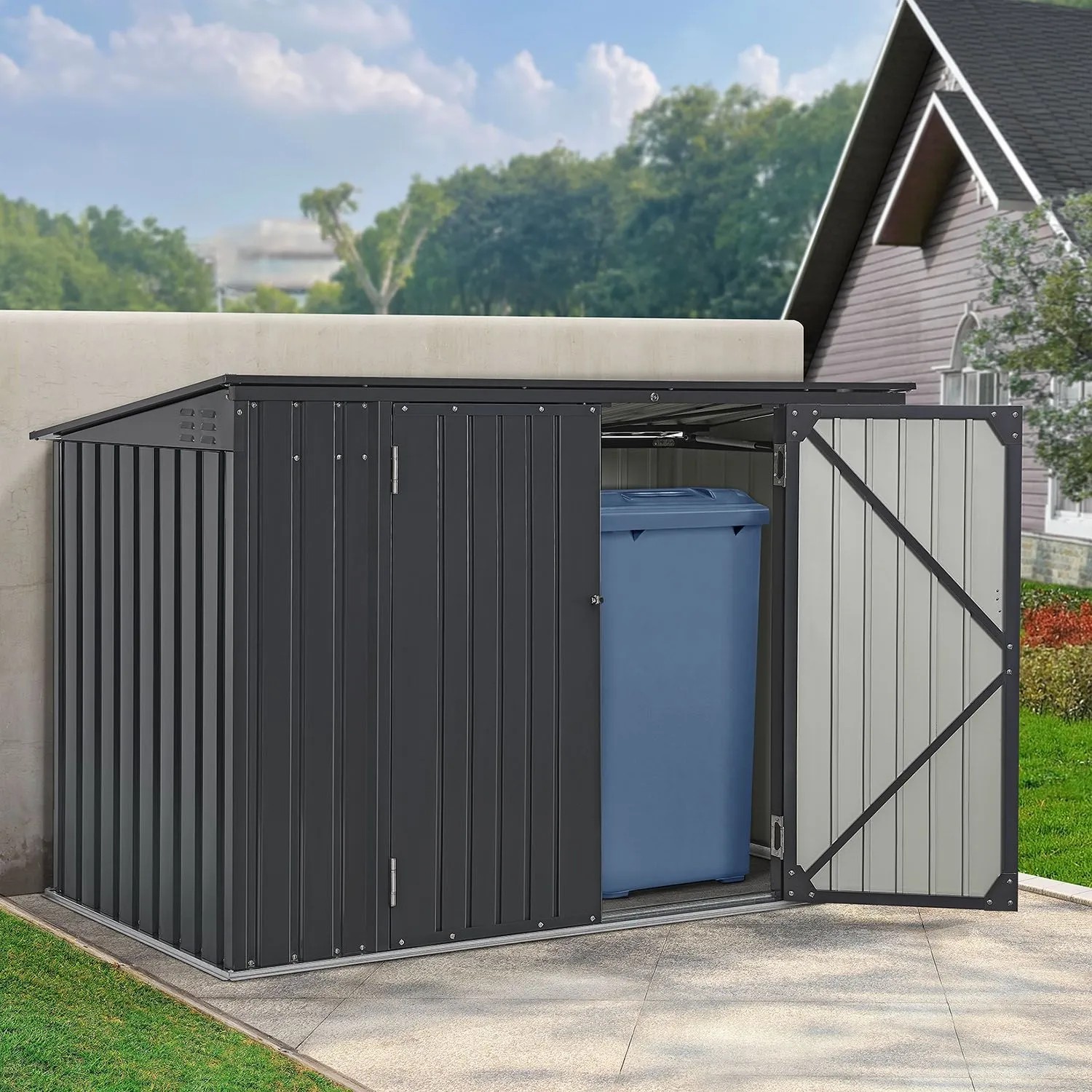 Graue Juskys Mülltonnenbox Namur aus Metall mit geöffneten Türen und Mülltonne.