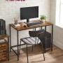 Vasagle Schreibtisch in Braun-Schwarz mit 2 Ablagen und Metallrahmen, ideal fürs Home-Office.