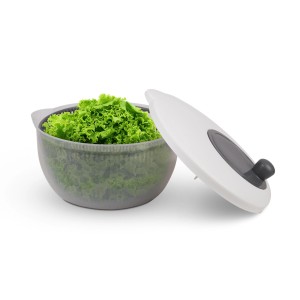 Graue ProHome Salatschleuder (4L, Ø25cm) mit Salat und Deckel. Küchenhelfer für frische Salate.