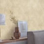 Beige Vliestapete „Shiny Concrete“ von Erismann Elle Decoration 4 mit Schwammoptik.