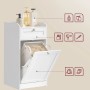 Weißer Songmics Badezimmerschrank mit Wäschesammler und Schublade.