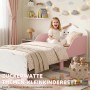Rosa-weißes AIYAPLAY Kinderbett mit lächelndem Wolken-Kopfteil, niedrigen Schutzleisten. Mädchen sitzt lachend im Bett.
