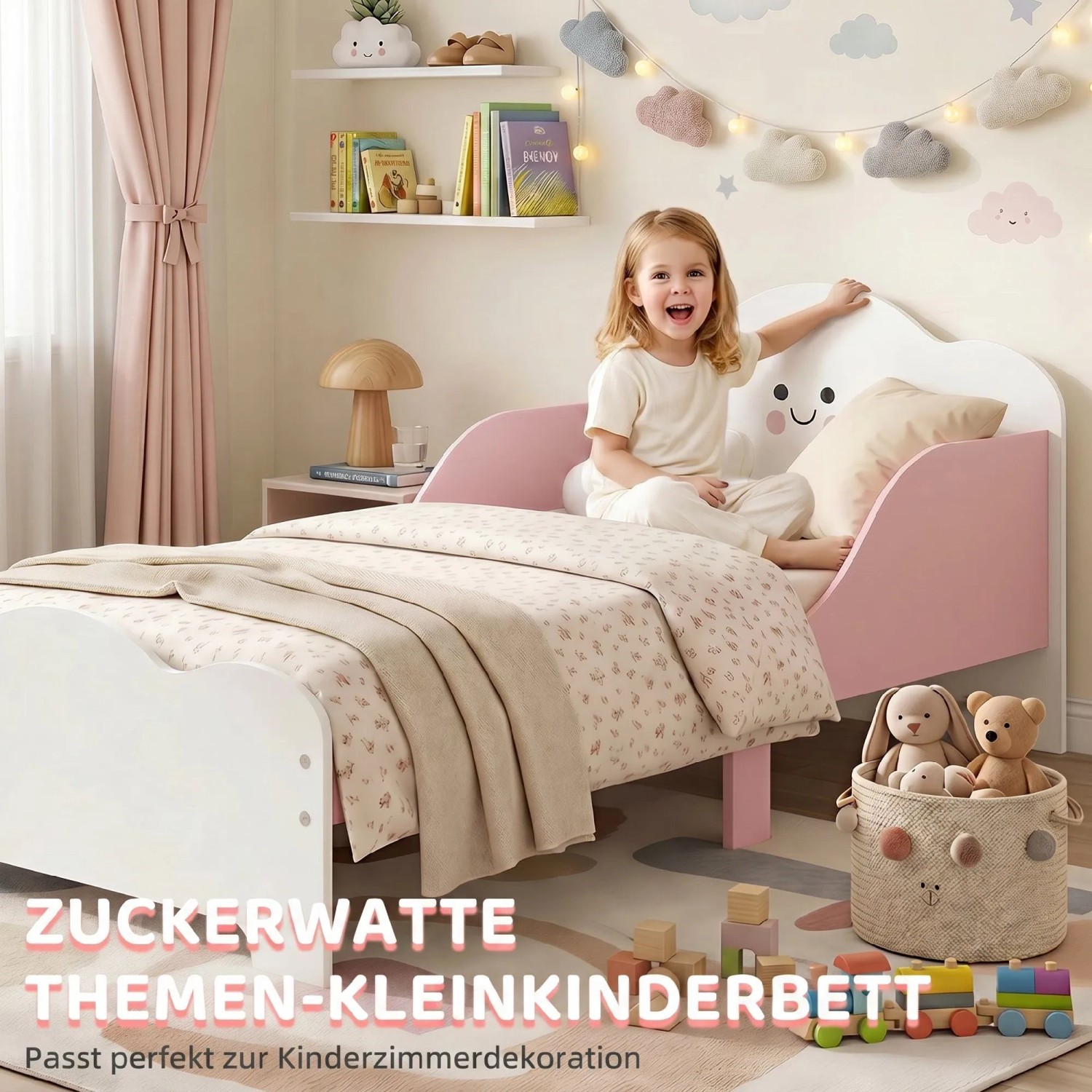 Rosa-weißes AIYAPLAY Kinderbett mit lächelndem Wolken-Kopfteil, niedrigen Schutzleisten. Mädchen sitzt lachend im Bett.