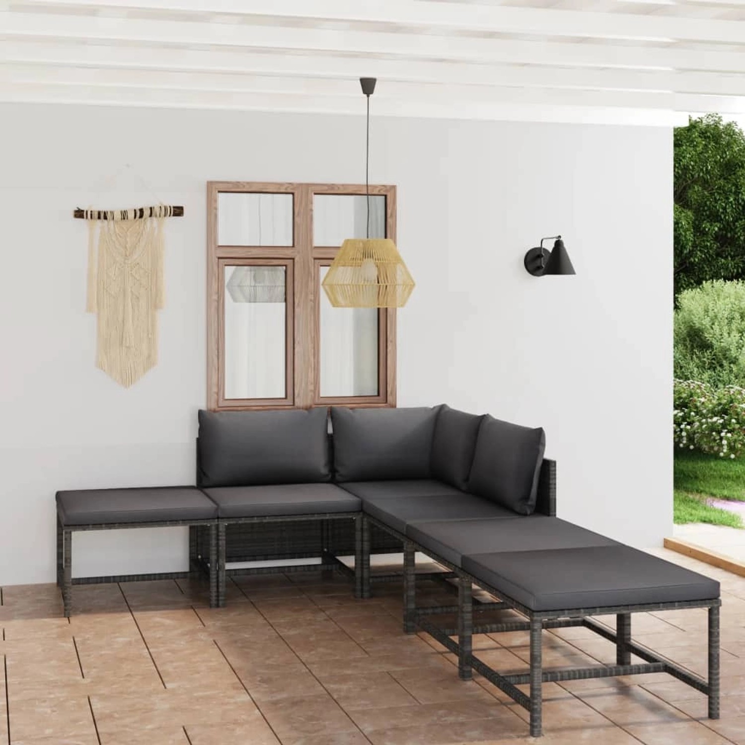 Graues 6-tlg. vidaXL Garten-Lounge-Set mit Kissen aus Polyrattan auf einer Terrasse.