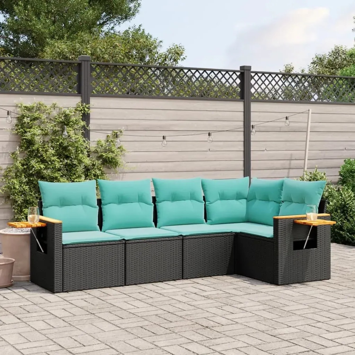Schwarze 5-tlg. Garten-Sofagarnitur aus Rattan mit türkisen Kissen. Gartenmöbel für Terrasse und Garten.