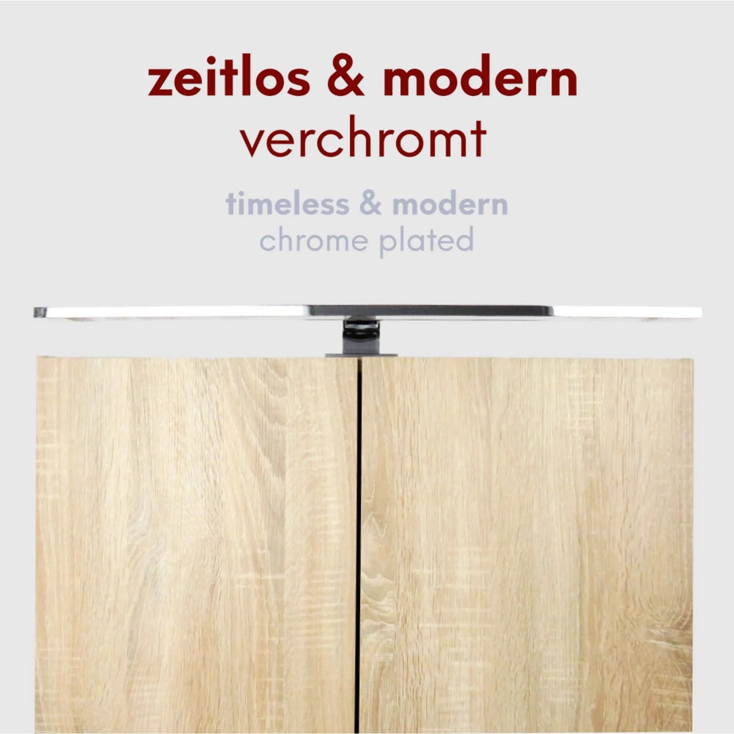 Verchromte LED Badleuchte (600mm) von kalb, neutralweiß, montiert auf einem Spiegelschrank.