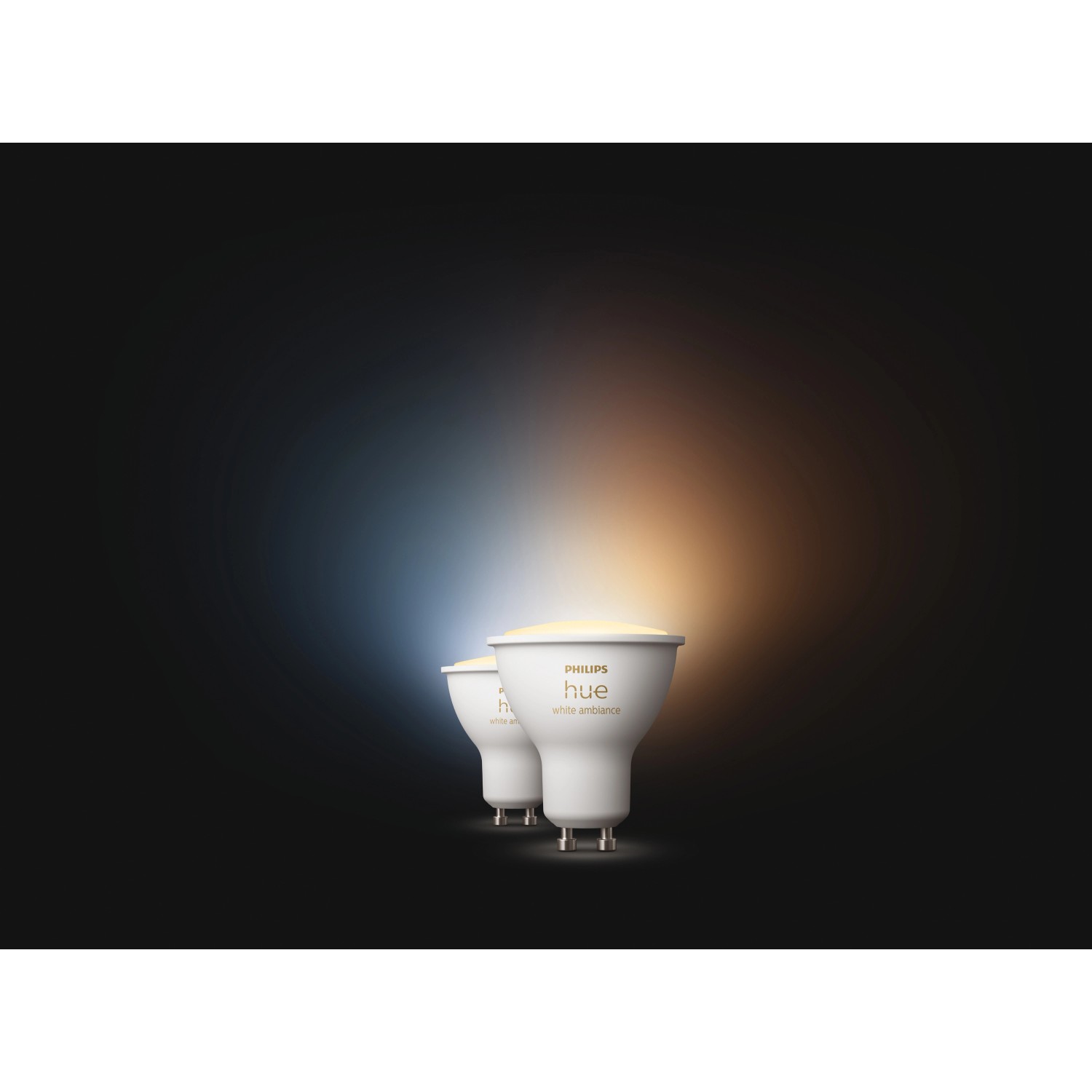 Zwei Philips Hue GU10 LED-Spots White Ambiance, einer mit kaltweißem, einer mit warmweißem Licht.