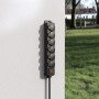 Schwarze Hama 6-fach Steckdosenleiste für Außenmontage (IP44) mit Schalter und 2 m Kabel an einer Wand.