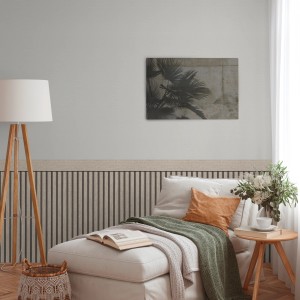A.S. Creation Vliestapete Wallpanel Grau-Schwarz mit Palmenmotiv im Wohnraum.