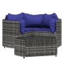 Graues 4-tlg. vidaXL Garten Lounge Set aus Rattan mit dunkelblauen Kissen und Tisch.