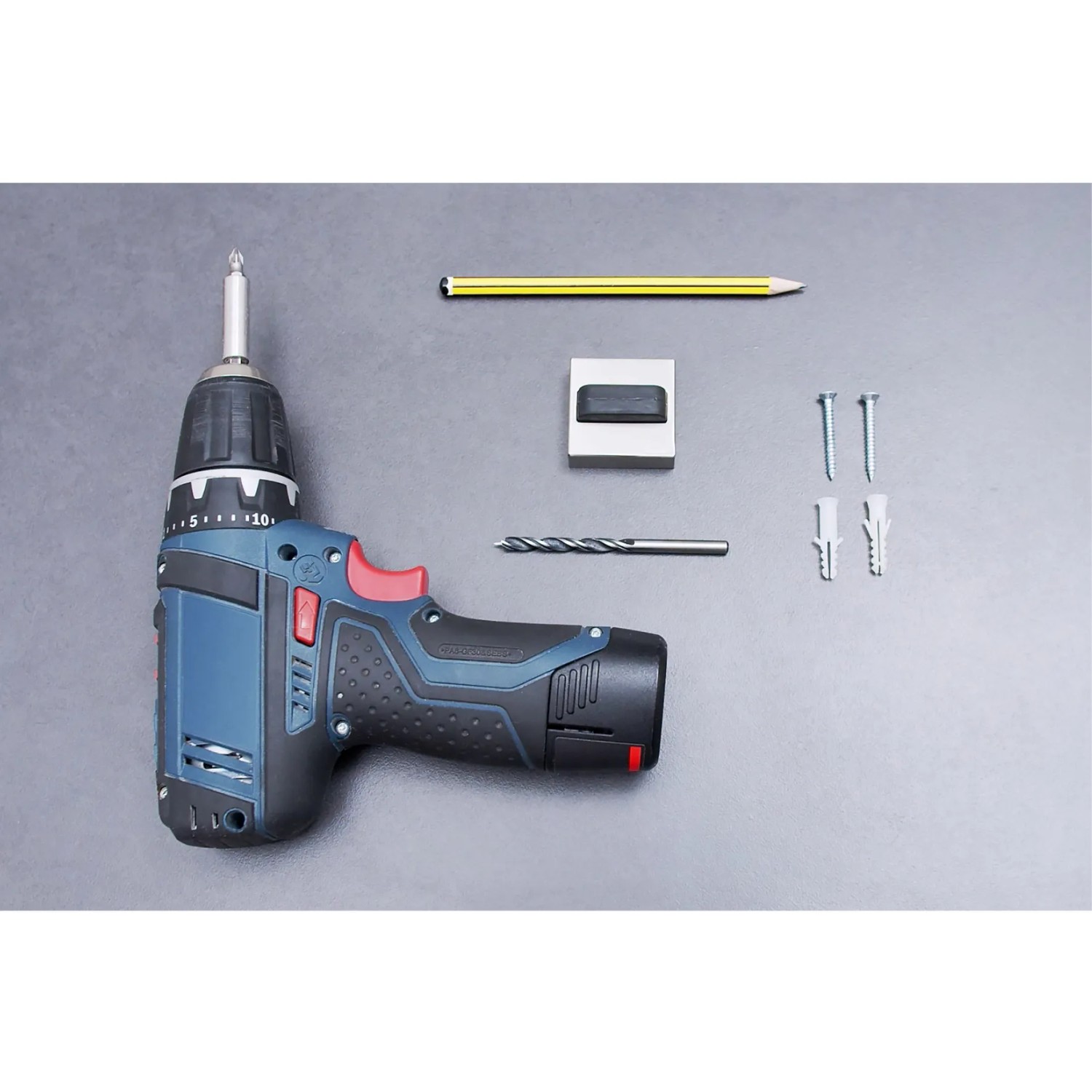 Wandtürstopper Edelstahl Optik mit Bohrmaschine, Dübel, Schrauben, Bleistift und Bohrer