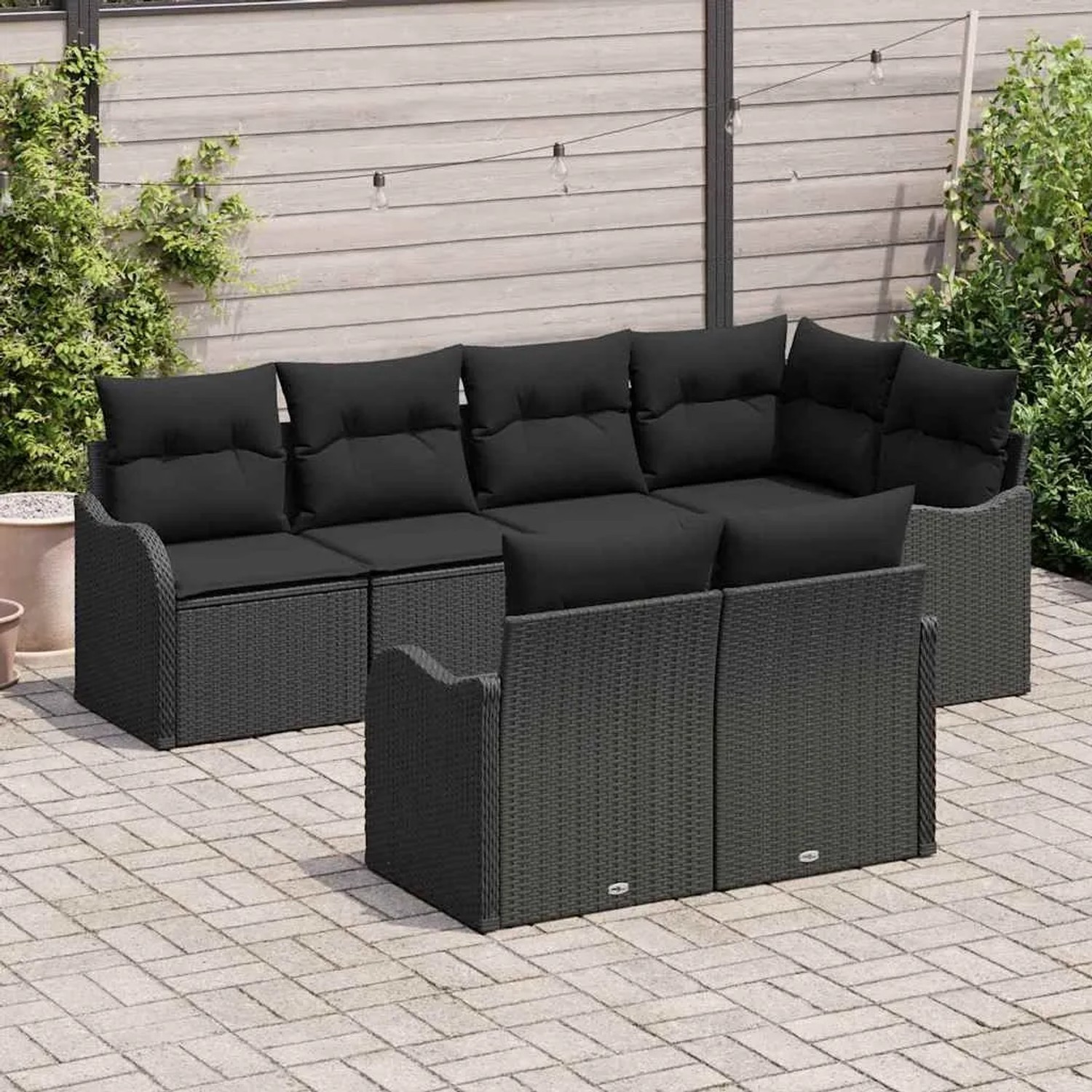 Schwarzes 7-teiliges vidaXL Garten-Sofa-Set aus Polyrattan mit Kissen. Gartenmöbel für 7 Personen.
