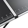 Detailansicht des vidaXL Tapeziertischs: Klappbarer Tisch mit schwarzer MDF-Platte und Aluminiumrahmen.