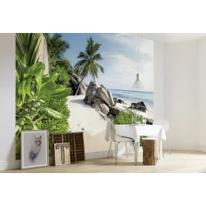 Vlies Fototapete mit Strandmotiv, Palmen und blauem Meer für ein entspanntes Ambiente.