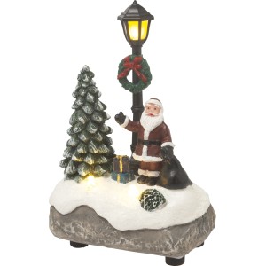 Beleuchtete Weihnachtsdeko: Weihnachtsmann, Baum und Laterne mit LED-Lichtern für festliche Stimmung.