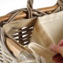 Rechteckiger Kaminholzkorb aus Rattan (Kubu grey) mit Leinenfutter und Griffen.