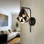 Eglo Wandleuchte Carlton, 1-flammig, schwarz-kupfer antik, im Wohnraum.