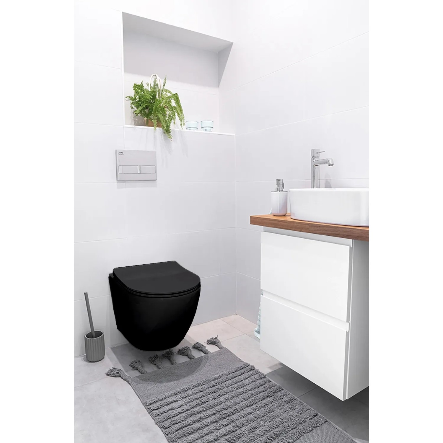 Modernes Bad Land WC Set mit schwarzer wandhängender ROLO Toilette, weißer TECEbase Spülplatte und Soft-Close Sitz.