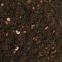 Dr.Soil Bonsai Substrat, 1L Beutel: Nahaufnahme der Erde mit kleinen Steinen und organischen Bestandteilen.