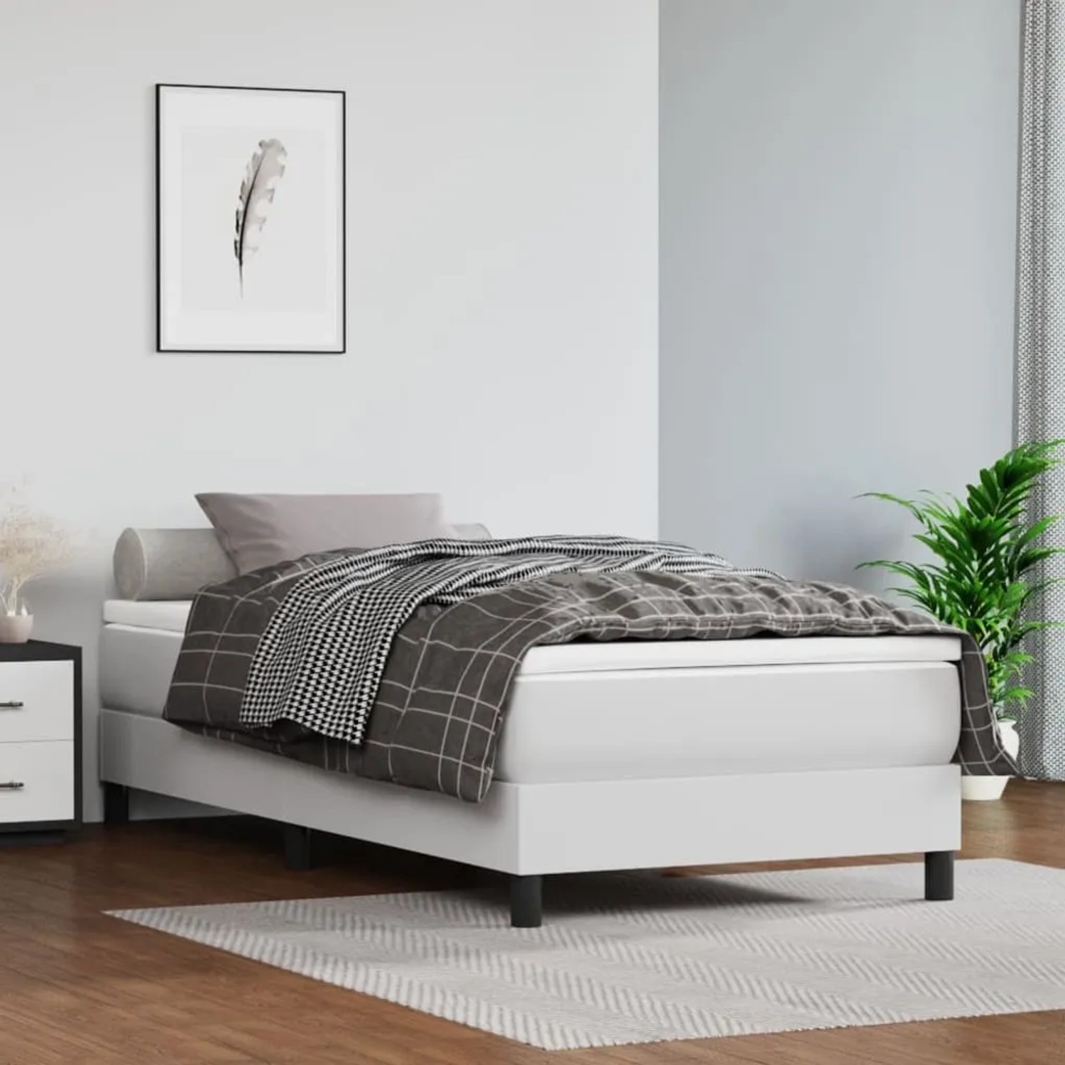 Weißes vidaXL Boxspringbett mit Matratze (90x190 cm) aus Kunstleder.