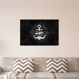 Schwarzes Wandbild mit Anker-Motiv und Spruch "Have less, travel more" als maritime Wanddekoration.