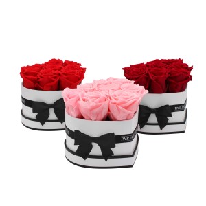 Rosenbox Herz, weiße Box mit rosa und roten Rosen, Schleife.