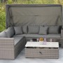 Graue Gartenmöbel Lounge-Gruppe San Marco mit Dach, Kissen und Tisch auf Terrasse.