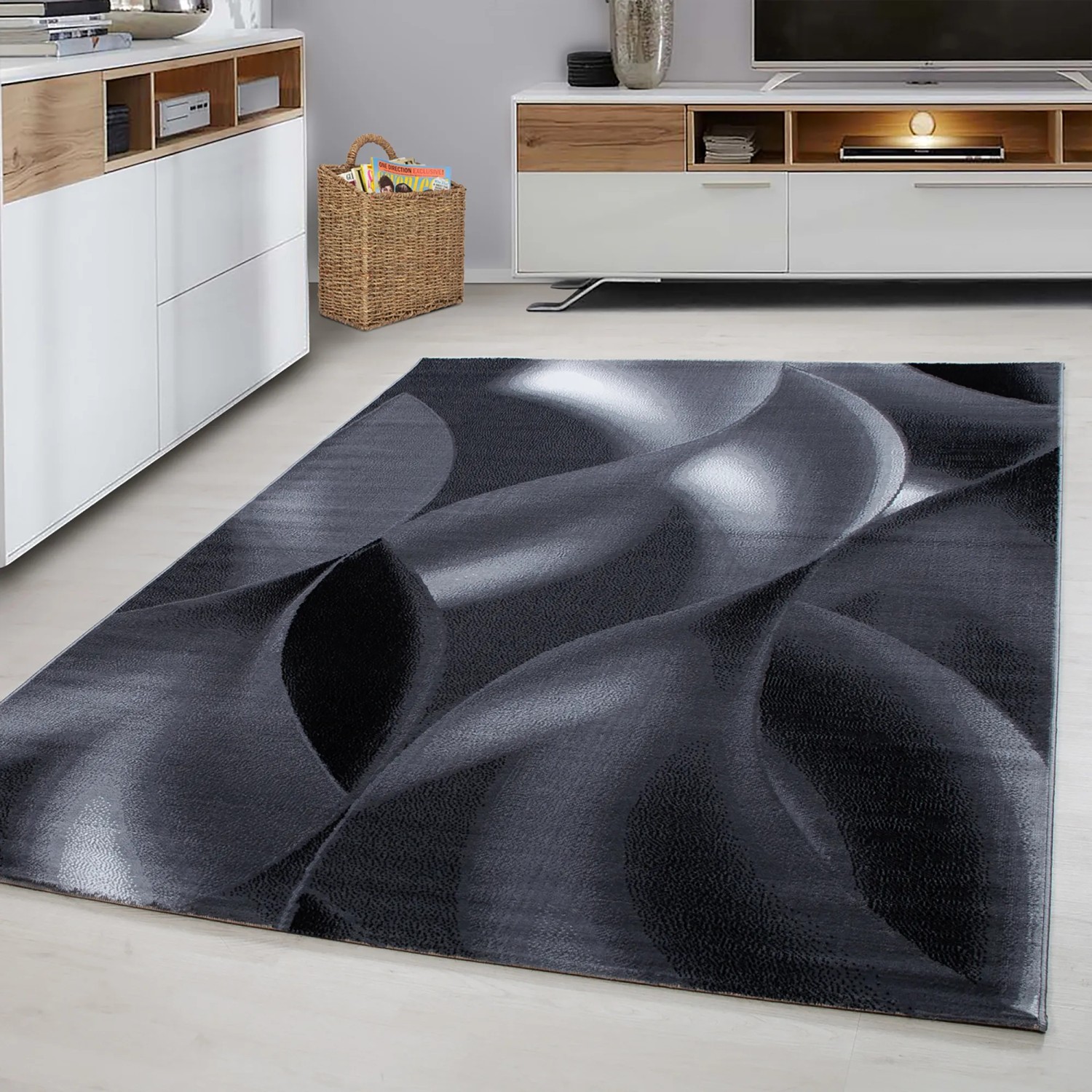 Schwarzer Ayyildiz Kurzflorteppich Plus mit modernem, wellenförmigem Muster, 80x150 cm.
