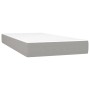 Hellgraues vidaXL Boxspringbett 90x190 cm mit Matratze und Topper.
