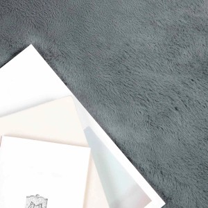 Runder, anthrazitfarbener vidaXL Kunstfell Teppich Hasen Olite, Ø 120 cm aus Polyester.