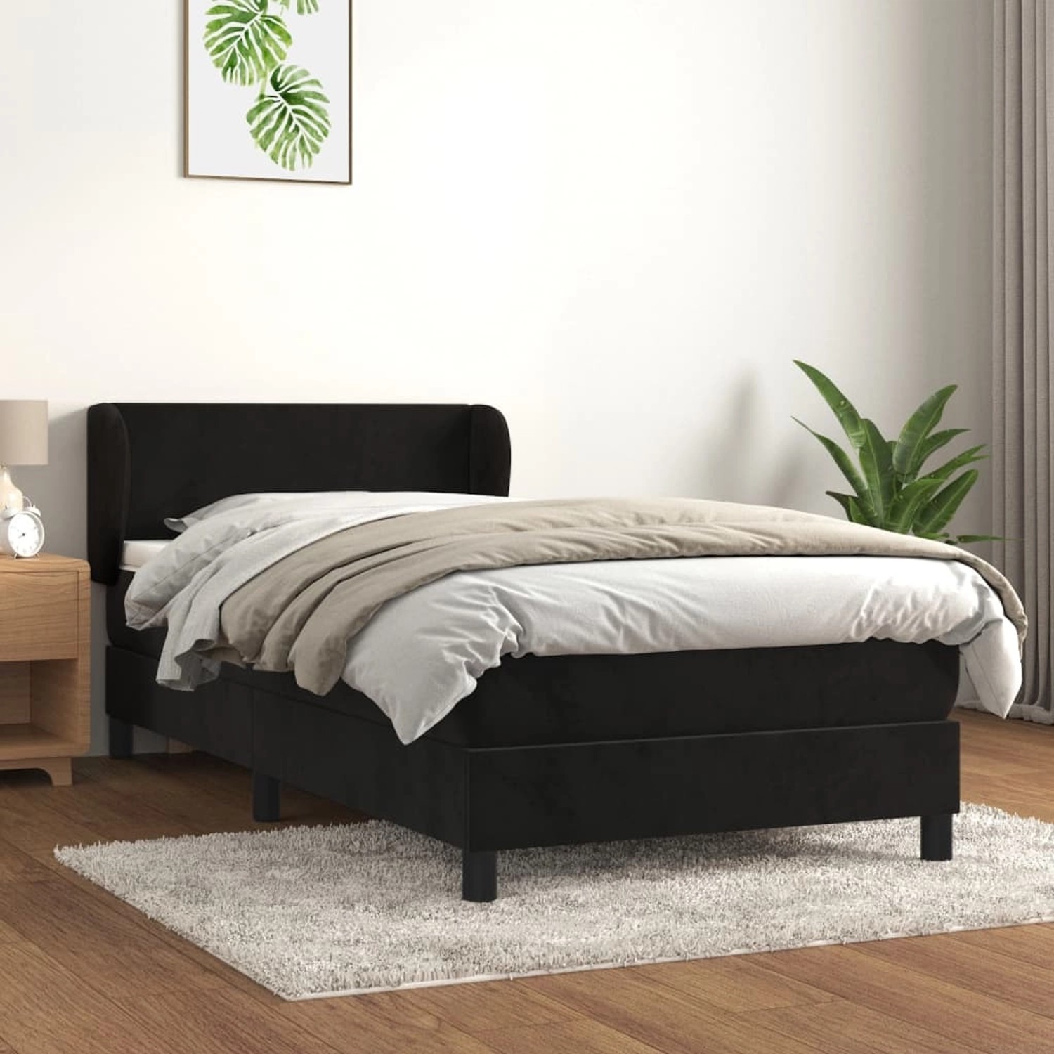 Schwarzes vidaXL Boxspringbett (90x200 cm) mit Matratze und Samtbezug.