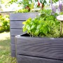 Garantia Hochbeet Ergo Vario 3 Wood mit Kräutern im Garten, modulare Bauweise.