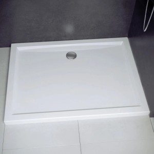 Weiße rechteckige KOLMAN Duschwanne 120x90 cm mit flacher Bauweise und Ablaufgarnitur für moderne Duschen.