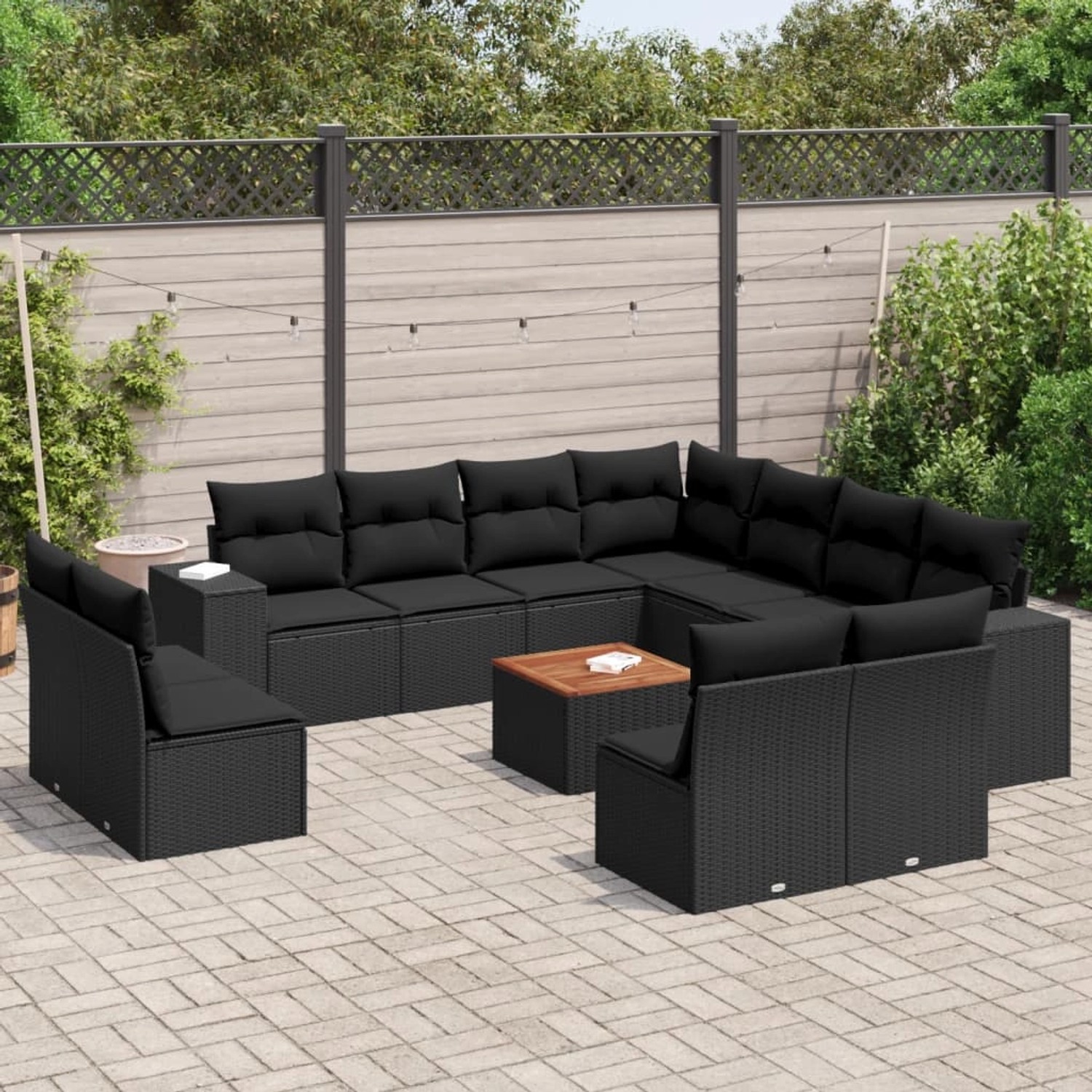 Schwarze 12-tlg. vidaXL Garten-Sofagarnitur aus Poly Rattan mit Kissen und Tisch.