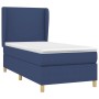Blaues Boxspringbett (90x190 cm) mit Matratze und Kopfteil. Stoffbezug.