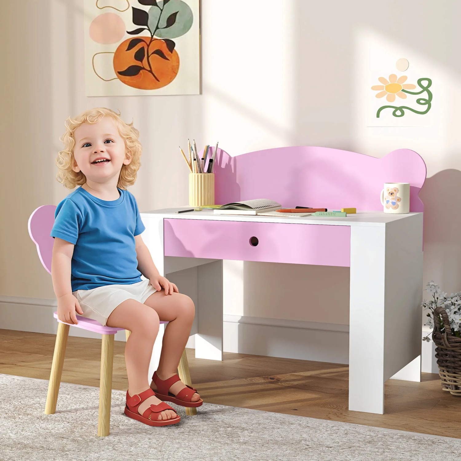 AIYAPLAY Kinderschreibtisch Set in Rosa und Weiß mit Schublade und Kind auf dem Stuhl.
