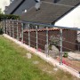 Treba Geländer-Set EB6, seitliche Montage, 150 cm, Edelstahl V2A, montiert im Garten.