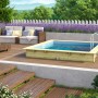 Karibu Holzpool Gr. 1 mit blauer Innenhülle und Leiter im Garten