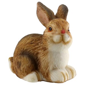 Brauner Deko-Hase aus Polyresin für die Osterdekoration.