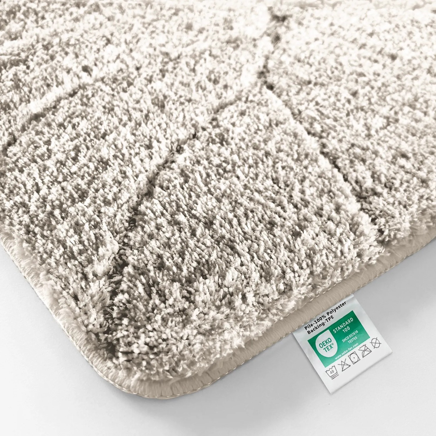 Karat Badematte Maris in Ivory, 50x80 cm, mit Blattstruktur. Flauschiger Badvorleger für Ihr Badezimmer.