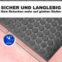 Robuste schwarze Gummi Stufenmatte mit Kreis Design auf Treppe. Wasser- & schmutzabweisend, rutschfest, für sichere Outdoor-Treppenstufen.