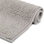 Hellgrauer Beautissu BeauMare FL Badteppich (50x60cm) mit Noppenstruktur und gerolltem Rand.