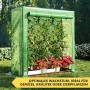 Grünes KARAT Gewächshaus Botanika mit Pflanzen und Gemüse im Garten.