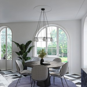 Schwarzer Sollux Lighting Kronleuchter Yoli 3 über Esstisch mit Stühlen.