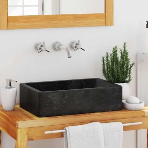 Schwarzes Marmor Waschbecken (45x30x12 cm) im modernen Badezimmer.