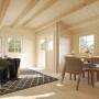 Innenansicht: Palmako Susanna Gartenhaus aus Holz mit Möbeln und Dekoration.