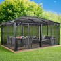 Sojag Pavillon Meridien 12x16 Anthrazit mit Moskitonetzen und Gartenmöbeln.