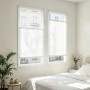 Weißes Klemmfix Plissee Faltrollo am Fenster im Schlafzimmer. Blickdichter Sonnenschutz ohne Bohren, flexibel verstellbar.