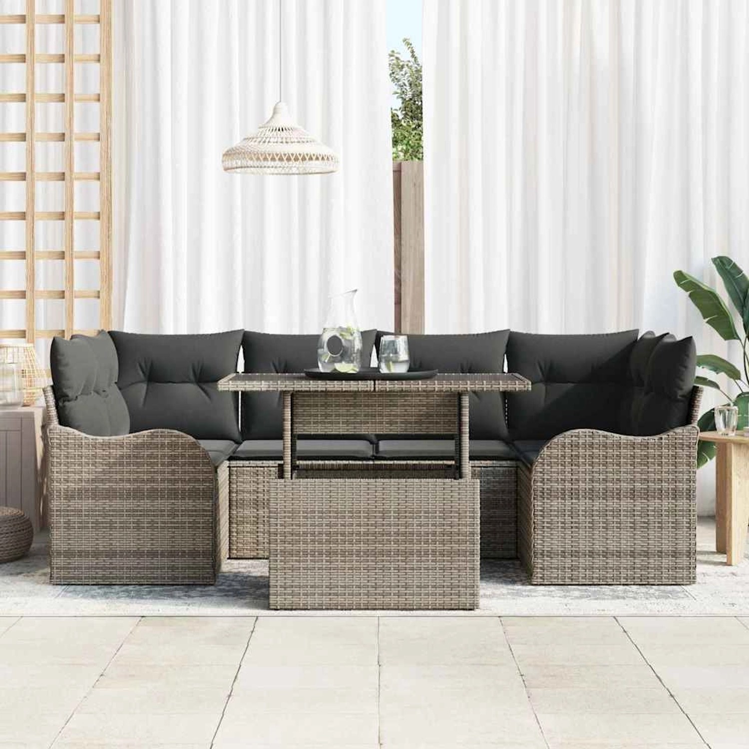 Graues 7-teiliges vidaXL Garten-Sofa-Set aus Poly Rattan mit Tisch und Kissen.